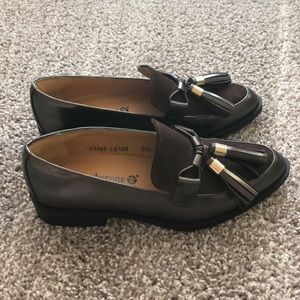 Brown leather loafers